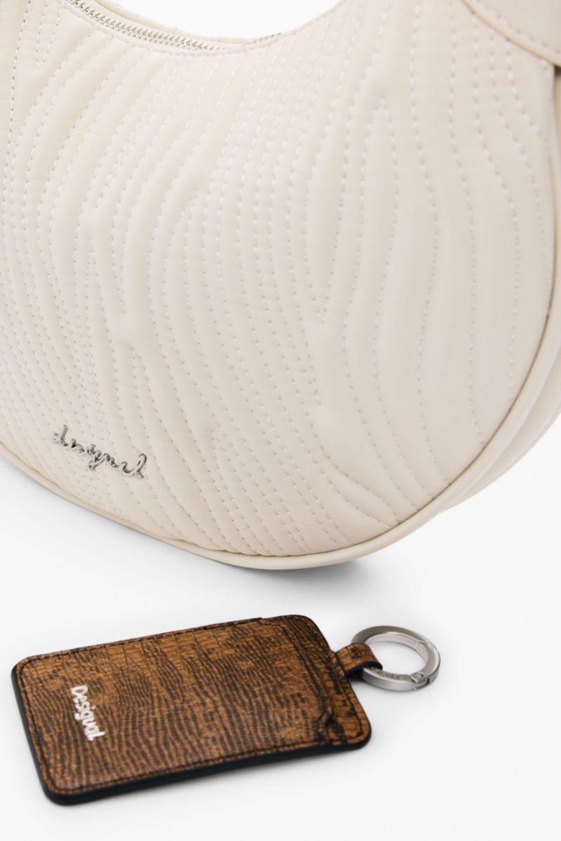 Women's Medium oval bag with embossing