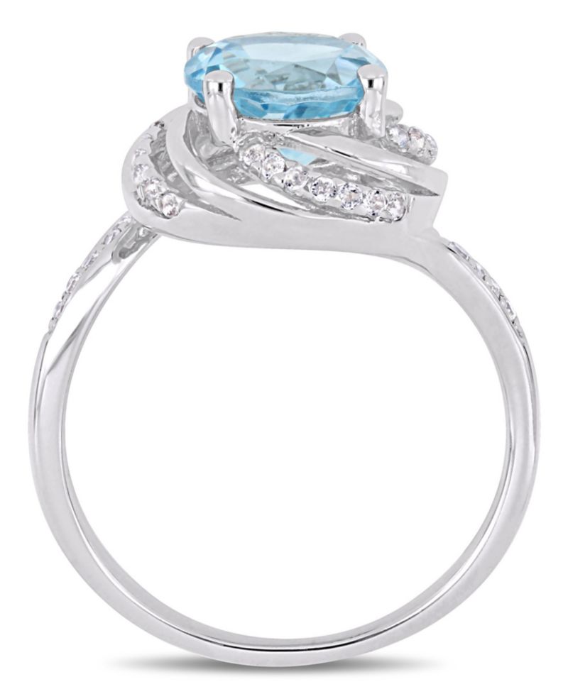 Blue Topaz (2-1/3 ct.t.w.), White Topaz (1/8 ct. t.w.) and Diamond Accent Interlaced Swirl Halo Ring in Sterling Silver