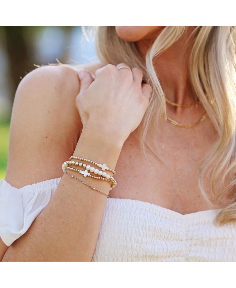 3mm Gold Filled Ball and Mother Of Pearl Cross Stretch Bracelet