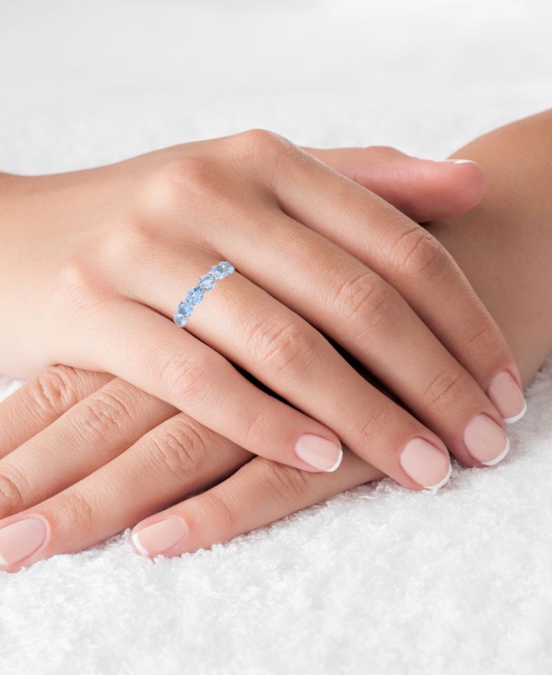 Created Light Blue Spinel Eternity Band in Rhodium Plated Sterling Silver
