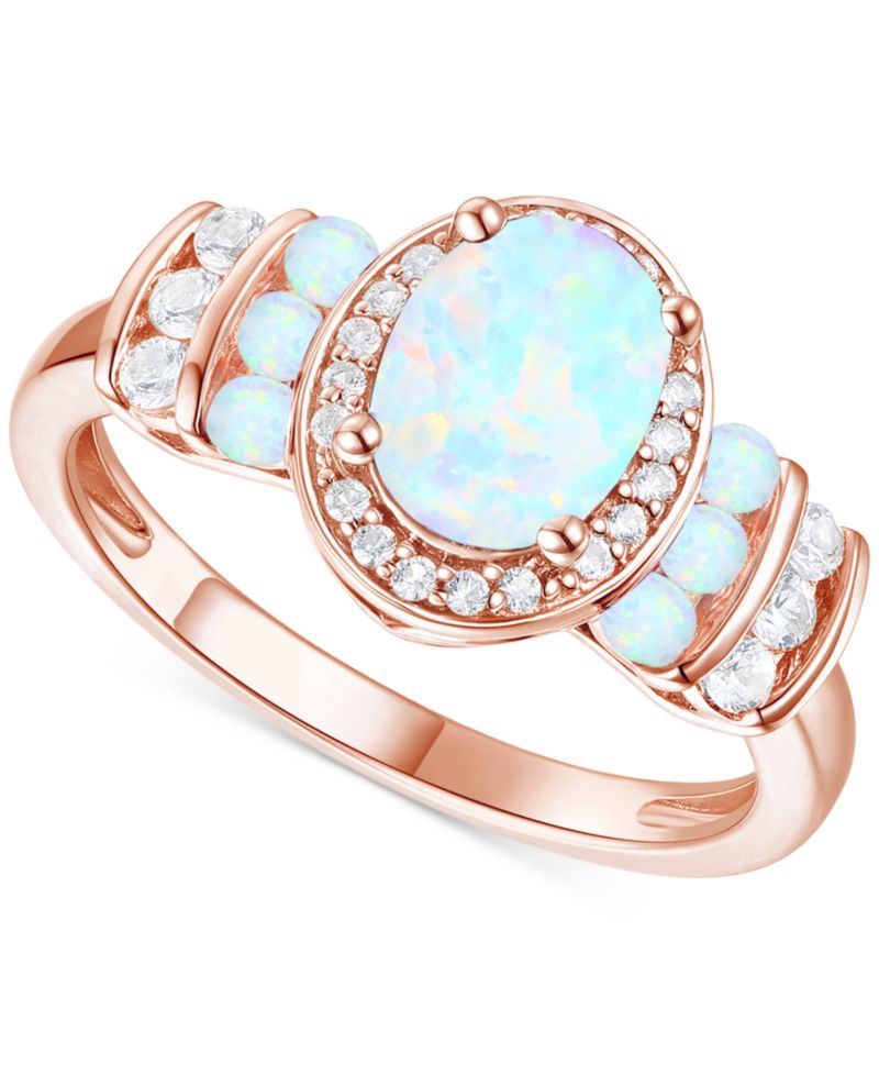 Lab-Grown Emerald (1-1/6 ct. t.w.) & Lab-Grown White Sapphire (1/4 ct. t.w.) Oval Halo Ring in 14k Gold-Plated Sterling Silver (Also in Additional Gemstones)