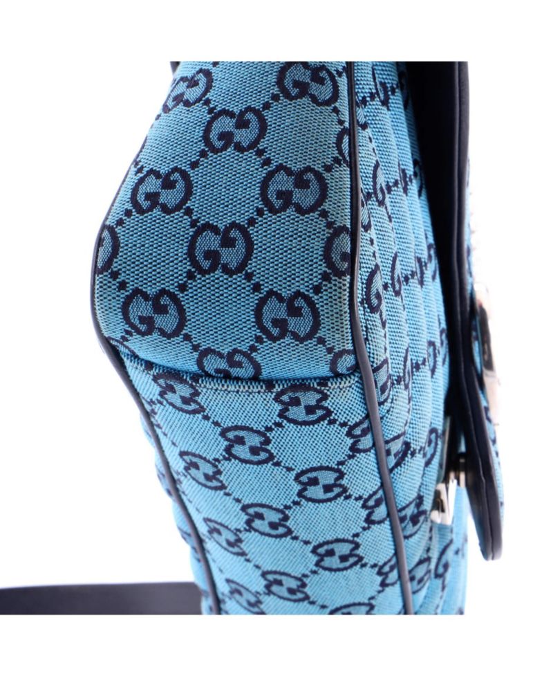 Small GG Marmont Flap Bag Diagonal Quilted GG Canvas with Leather