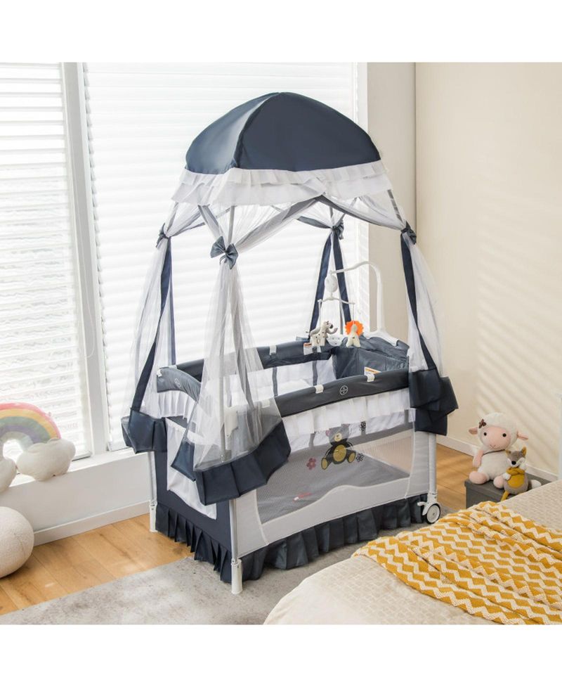 Baby 4-in-1 Convertible Baby Bassinet with Changing Table, Music Box and Wheels