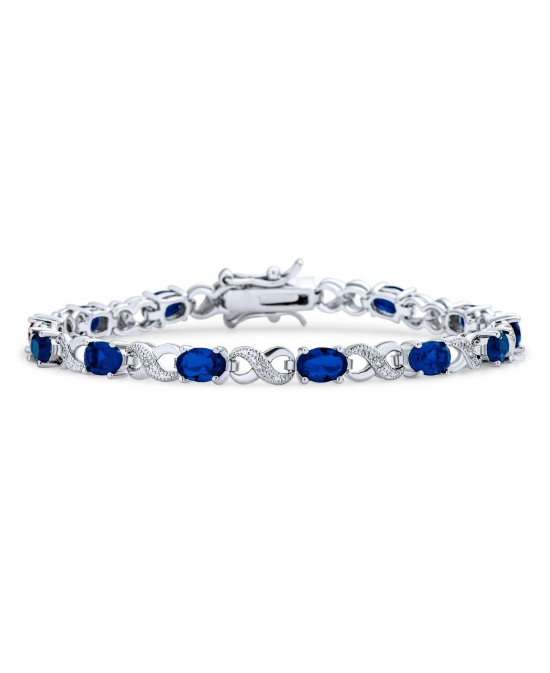 Birthstone Dark Pink Color CZ Oval Infinity Tennis Bracelet Silver Plated