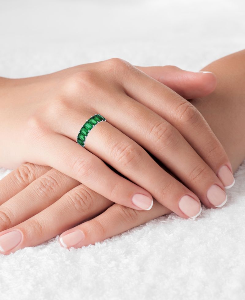 Green Emerald Cut Cubic Zirconia Eternity Band in Rhodium Plated Sterling Silver