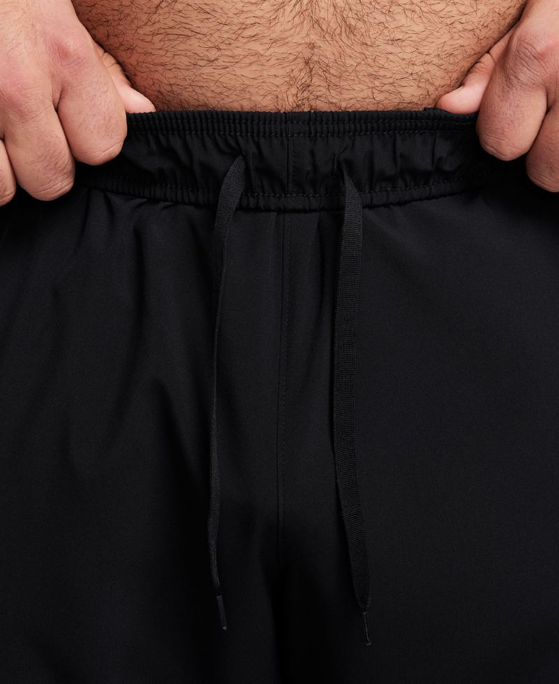 Мужские тренировочные брюки Form Dri-FIT стандартной посадки с зауженными штанинами
