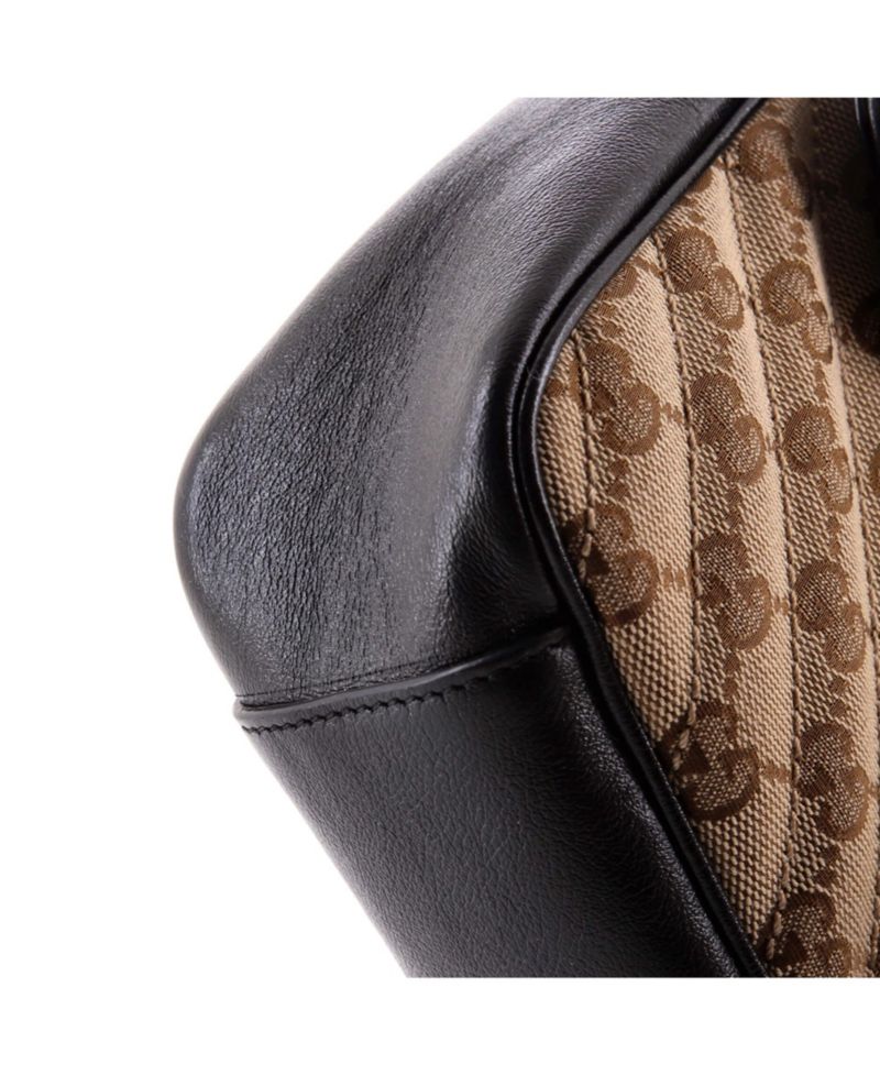 Small GG Marmont Flap Bag Diagonal Quilted GG Canvas with Leather