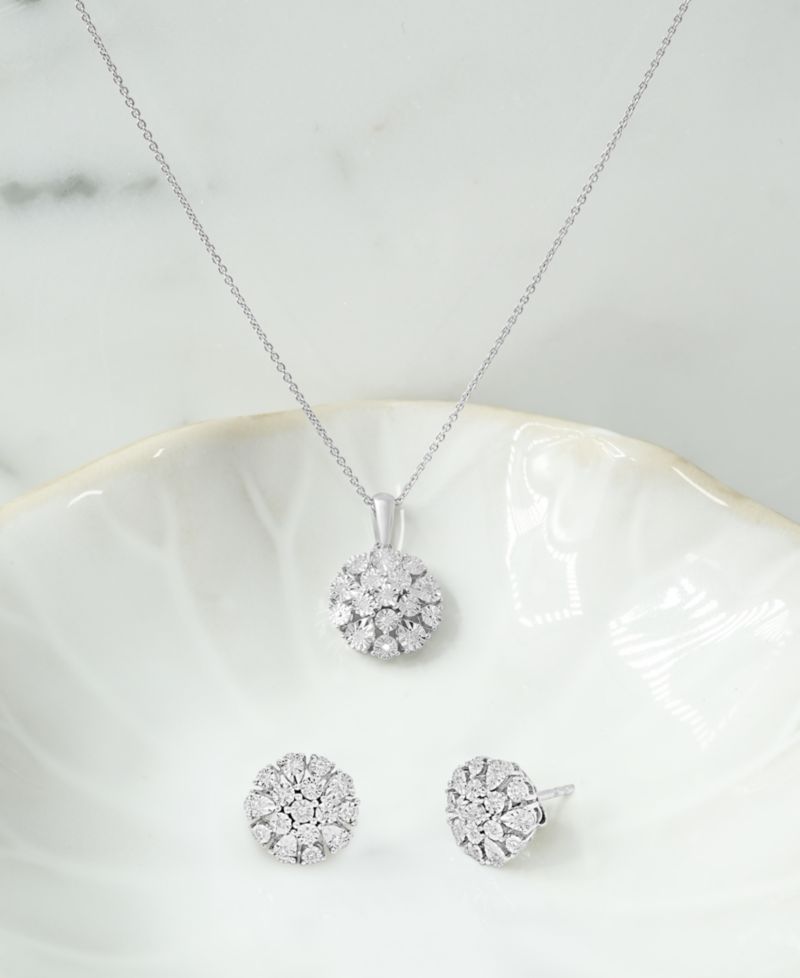 Diamond Flower Burst Stud Earrings (1/10 ct. t.w.) in Sterling Silver