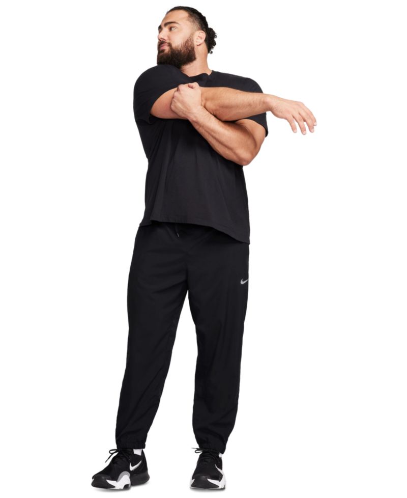 Мужские тренировочные брюки Form Dri-FIT стандартной посадки с зауженными штанинами