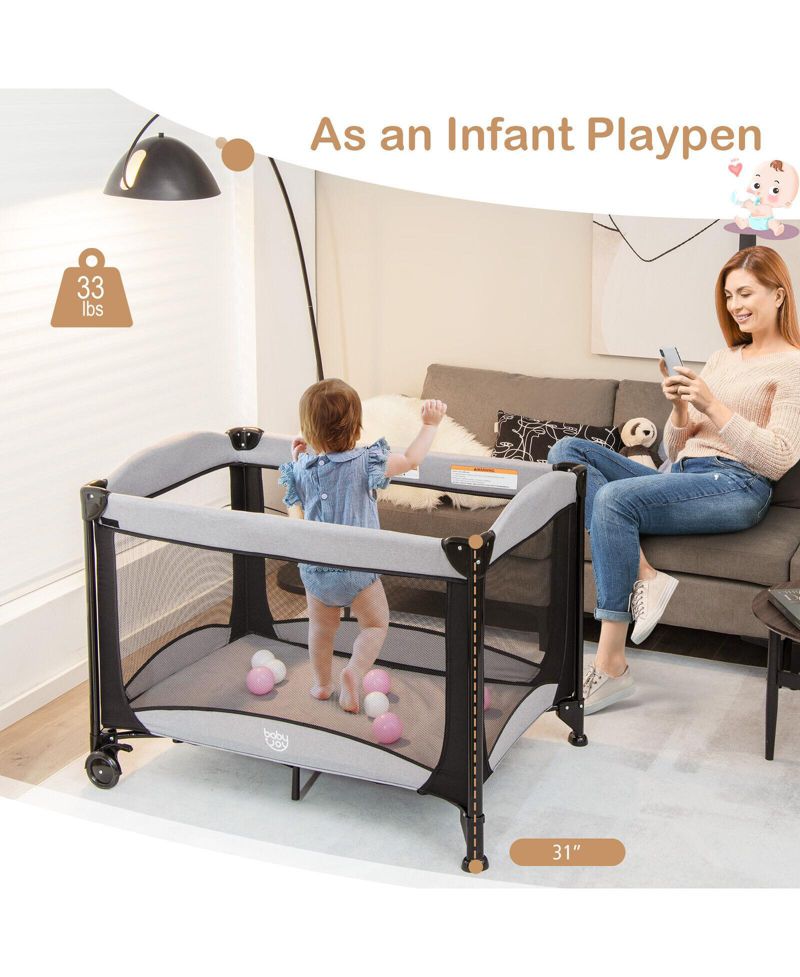 5-in-1 Portable Baby Playard with Cradle and Storage Basket